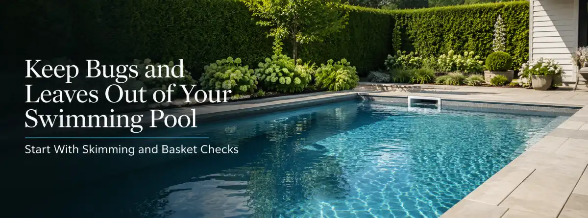 Pool skimmer basket and clean pool water showing leaf debris prevention