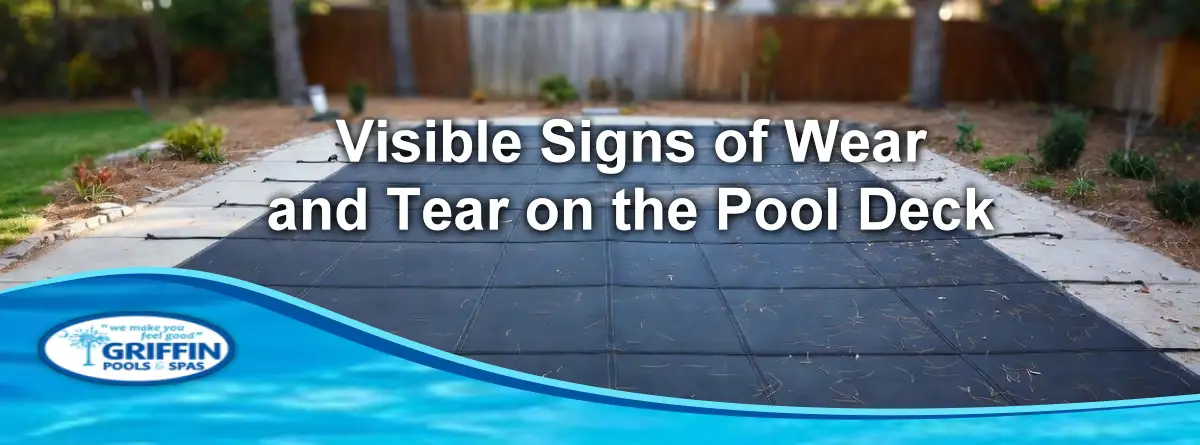 Close view of a mesh pool safety cover installed on an inground swimming pool